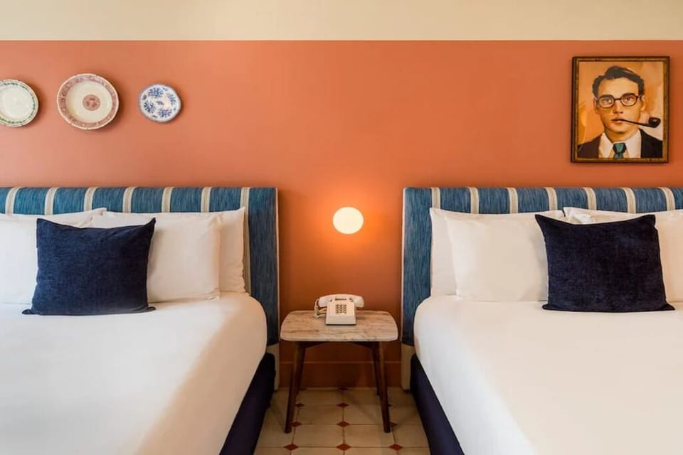 Drift off between plush pillows in a calm, cozy room.