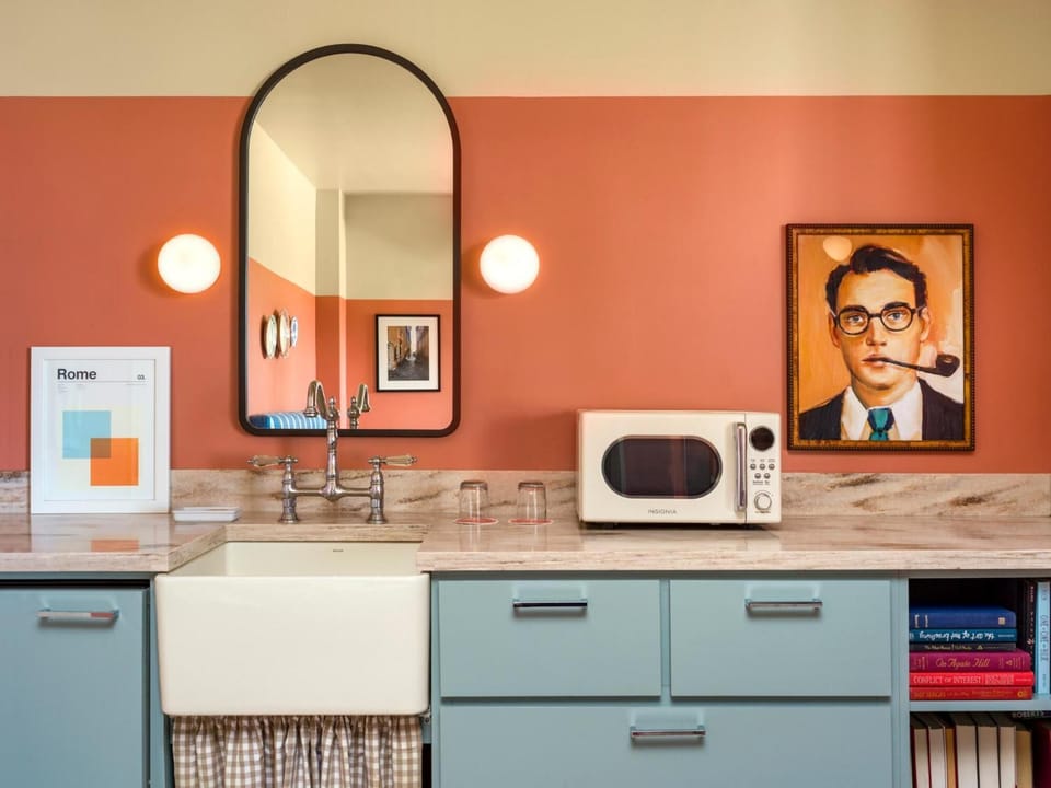 Enjoy easy snacks with a charming kitchenette and vintage touches.