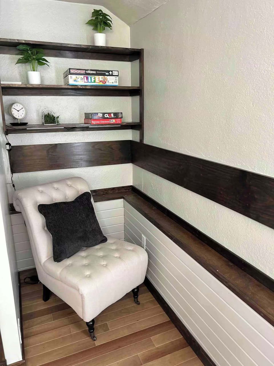 Seating area in the step down living room, with board games for the family!