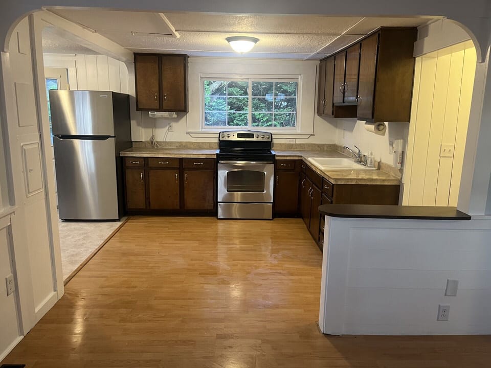 Nice counter top space and plenty of cabinets.  AC
