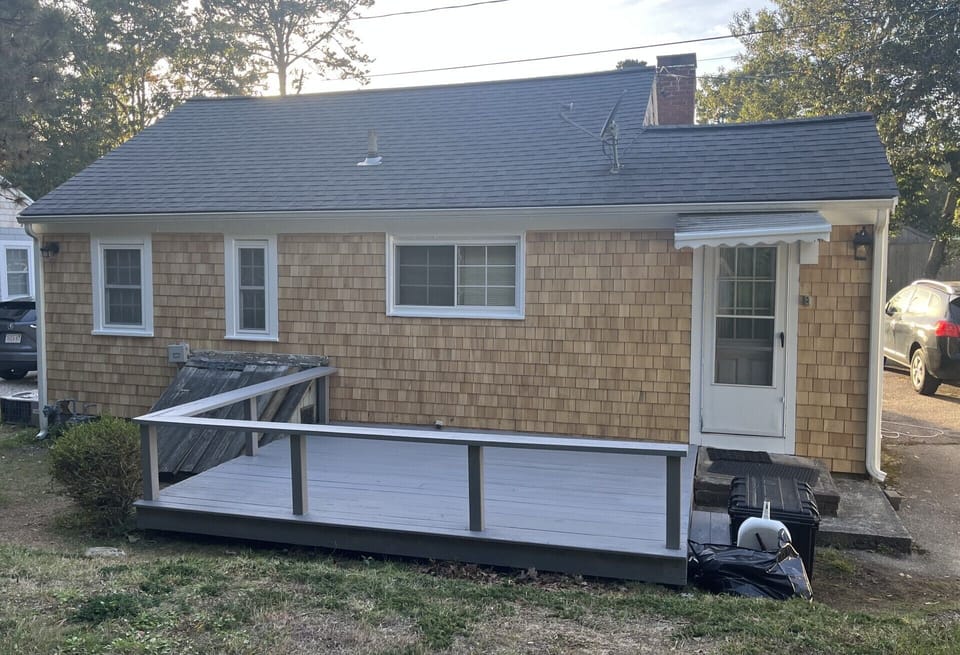Back deck includes seating, BBQ Grill and outdoor lighting