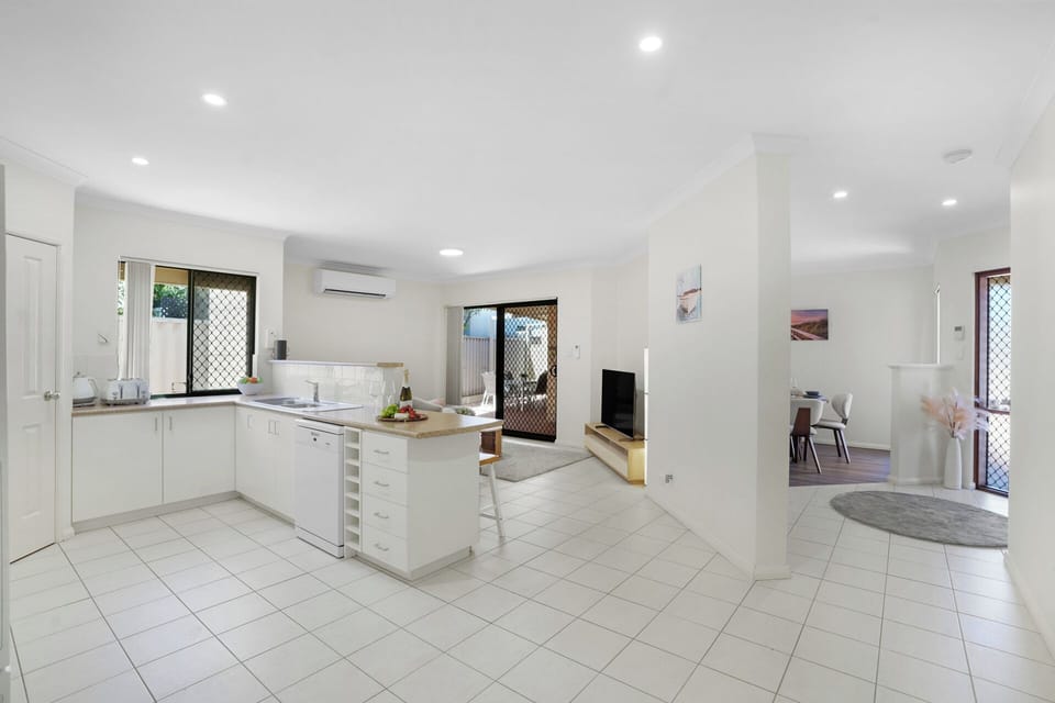Spacious open-plan kitchen, living and dining area designed for easy, relaxed stays together.