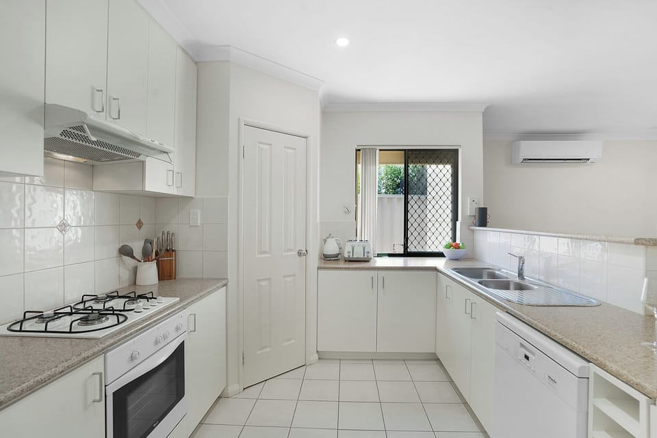 Bright, fully equipped kitchen with everything you need to cook and dine comfortably.