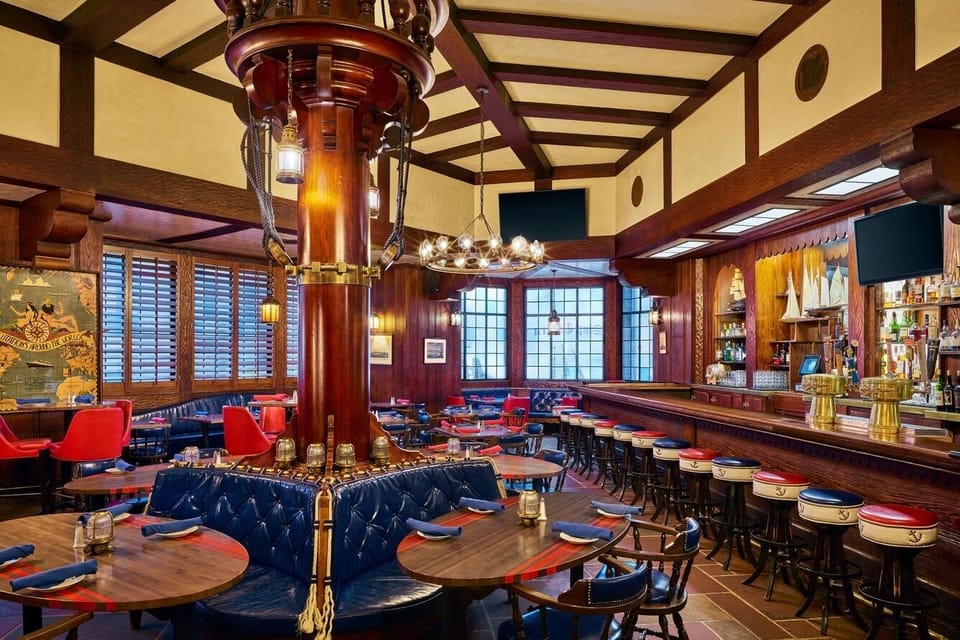 Gather for late-night bites at the classic wood-paneled bar.