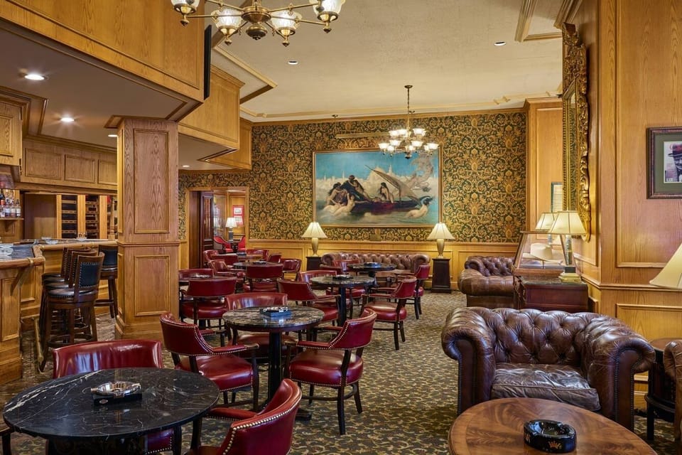Settle into plush leather seating for relaxed conversation and drinks.