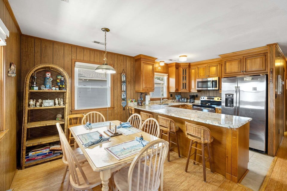 The open layout keeps everyone connected, whether you're lounging, dining, or cooking.