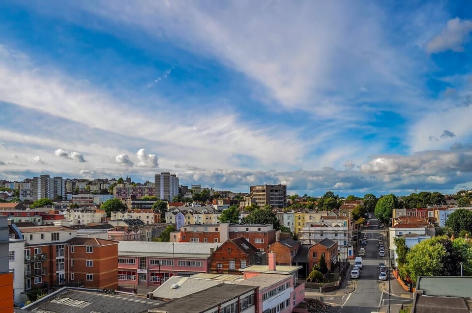 Rooftop with city skyline and open skies