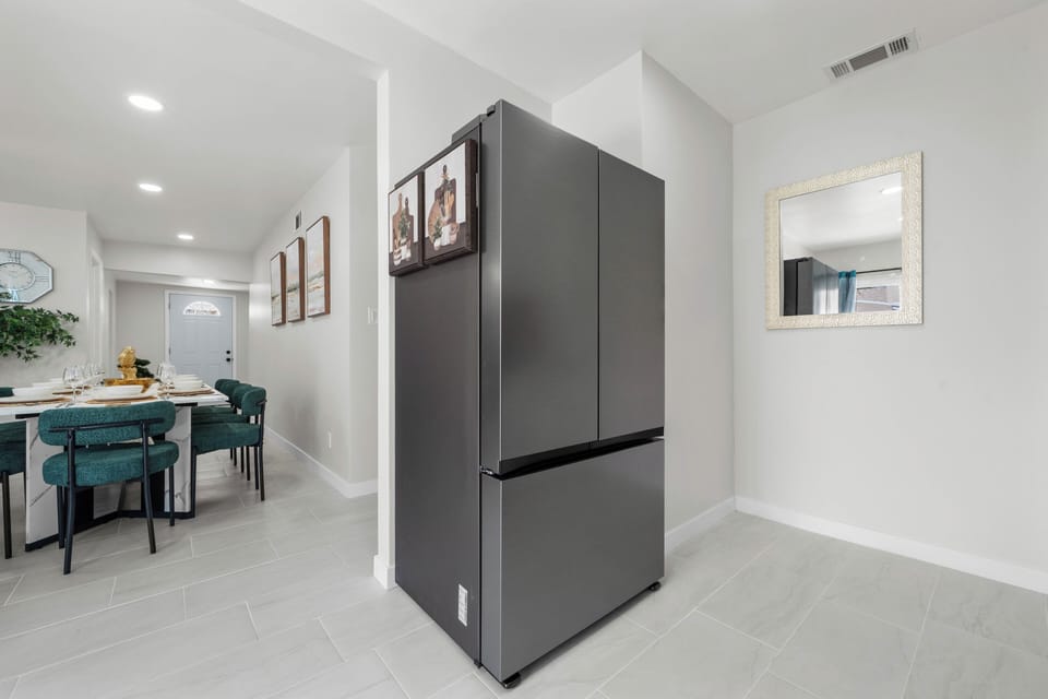 Modern dining area with open layout and easy access to the kitchen.