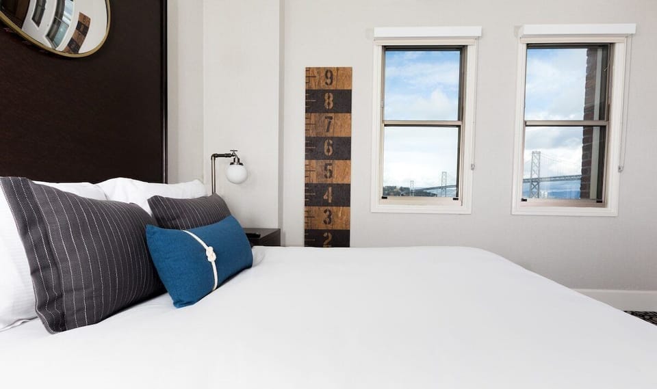 Wake up to bright daylight and captivating skyline bridge views