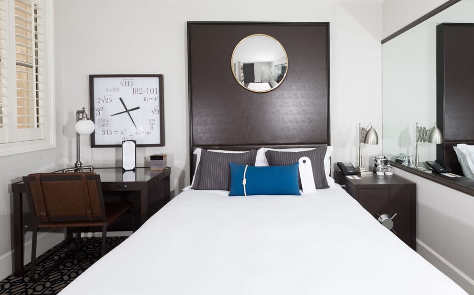 Sink into crisp bedding and enjoy a sleek, modern retreat