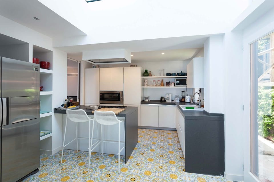 Kitchen, Flooring, Interior Design, Countertop, Floor, Kitchen Appliance, Furniture, Ceiling, Major Appliance, Cabinetry
