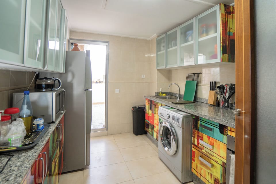 Kitchen with direct access to the terrace