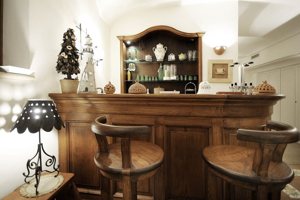 Furniture, Wood, Interior Design, Flooring, Lighting, Bar Stool, Cabinetry, Wood Stain, Hardwood, Countertop
