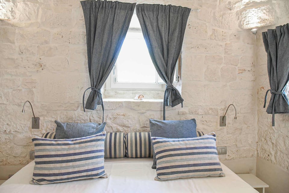 Furniture, Interior Design, Bedroom, Textile, Linens, Bed, Lighting, Room, Throw Pillow, Pillow