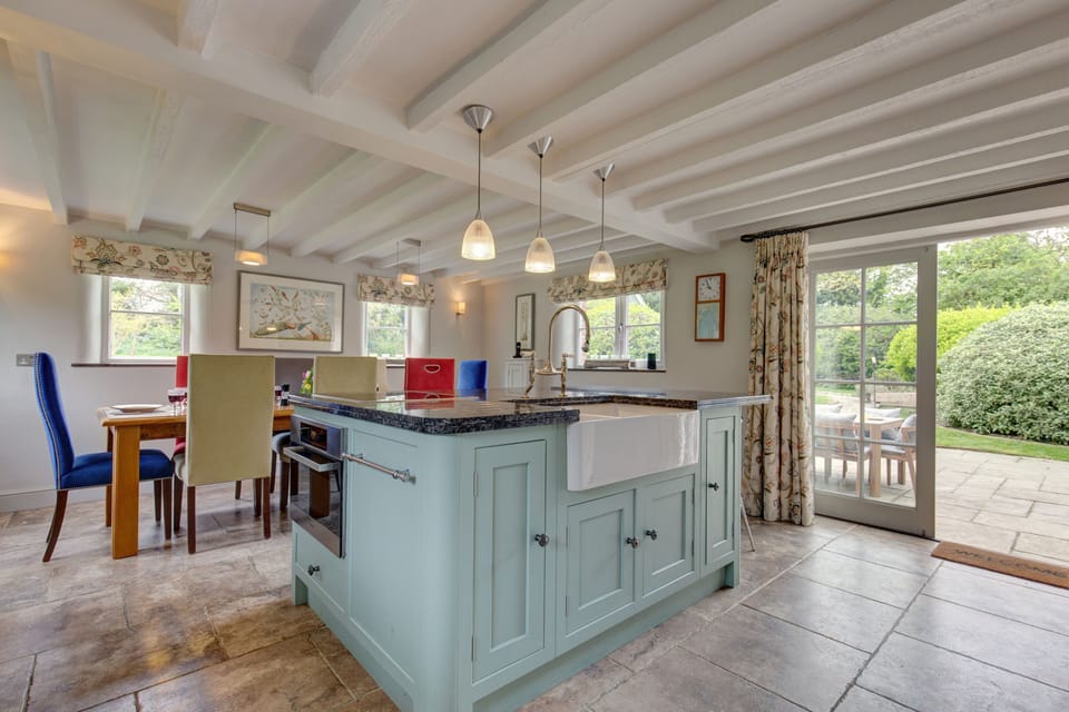 Drift Cottage (Salthouse): Kitchen/ diner with door to the one-acre garden