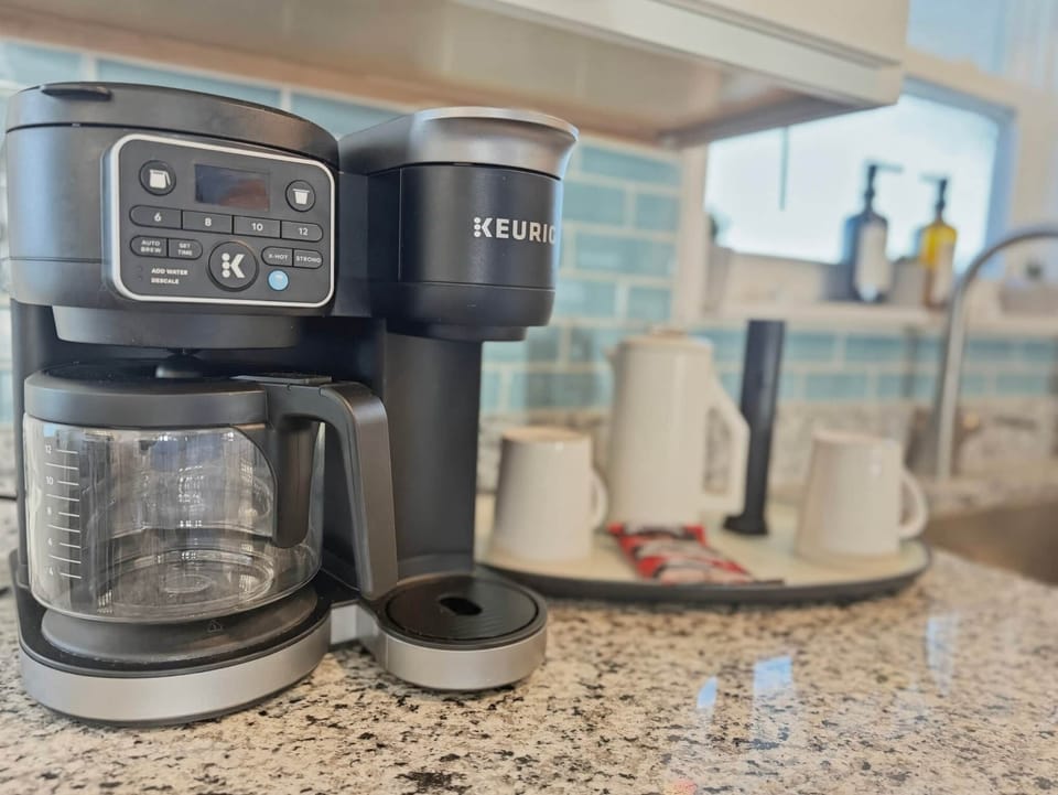 Coffee station. Coffee, creamer, sugar and artificial sweetener  packets provided.