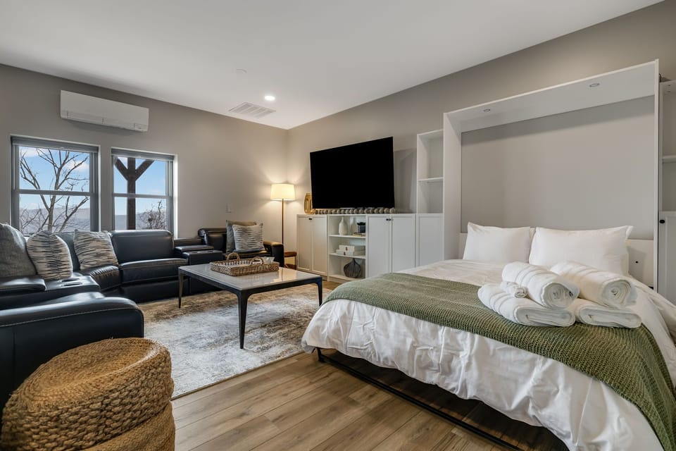 Lower Level - Living/Sleeping Bedroom Three - Queen Murphy Bed
