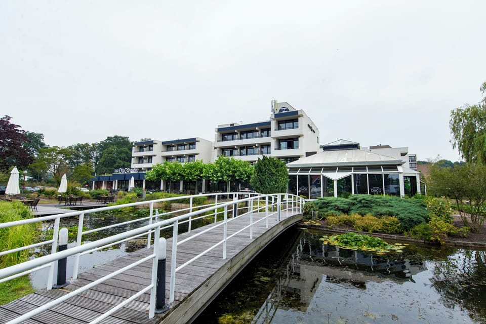 Step outside to serene waterside views and garden paths.