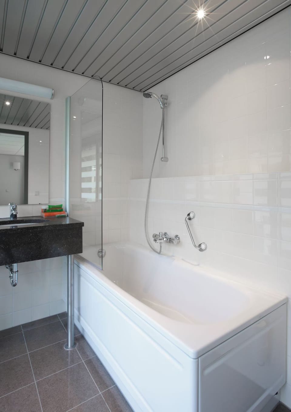 Soak and reset in a spotless tub-shower combo after adventures.