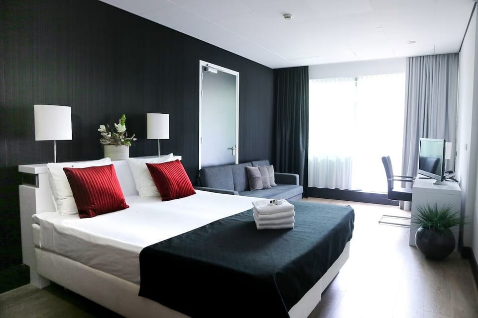 Unwind in crisp linens and a bright, airy room.