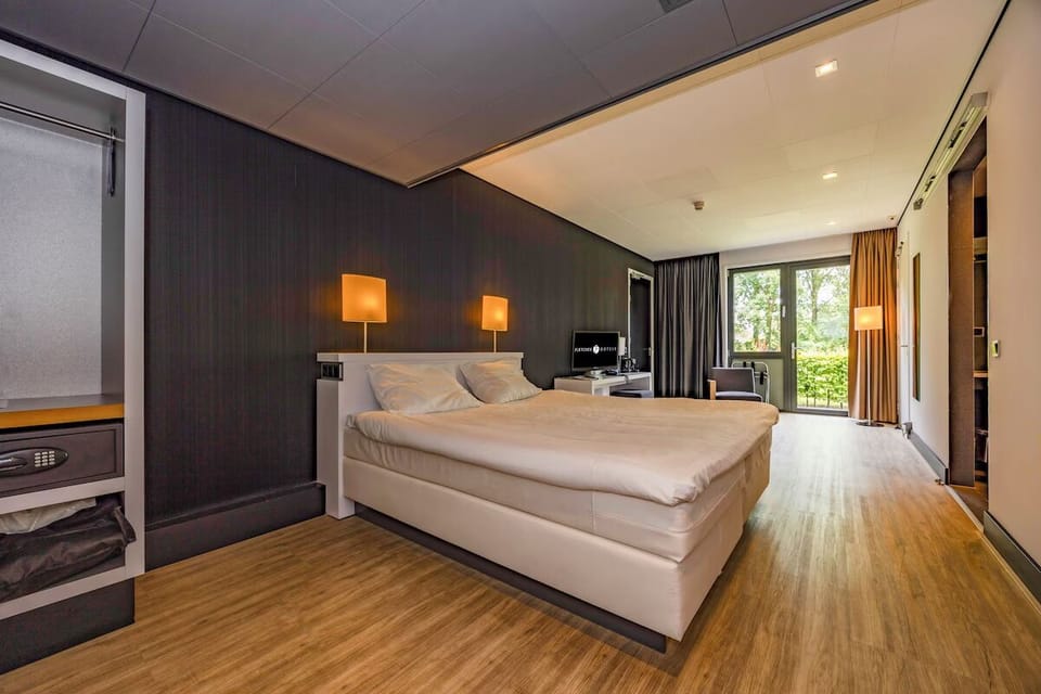 Sink into crisp bedding and wake to garden views.