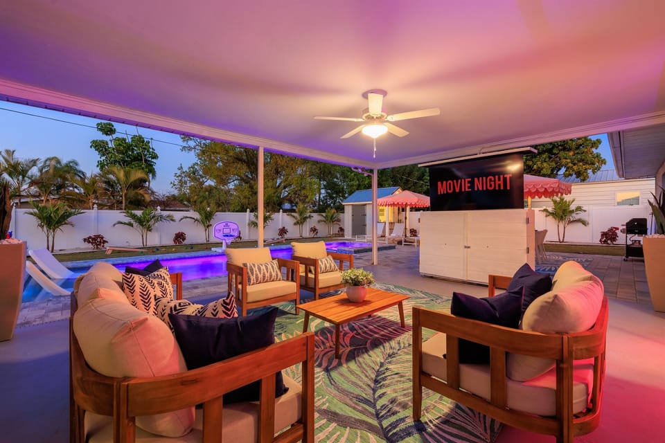 As the sun sets, the backyard comes alive—watch a movie by the pool, relax under the patio lights, and end the night with unforgettable vacation moments.