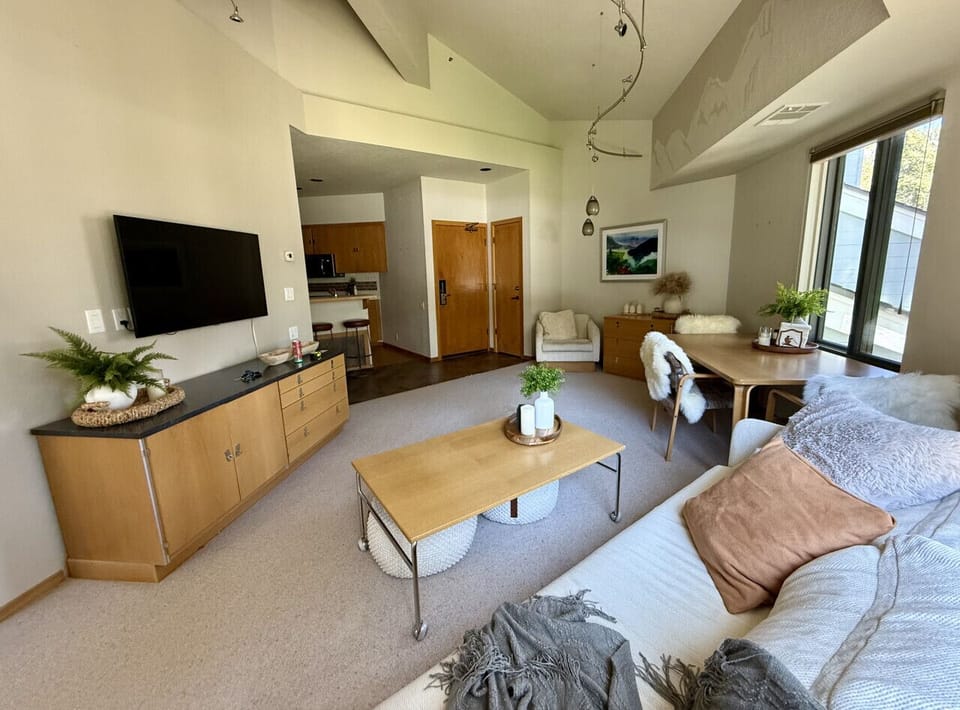 Comfortable and cozy living space with seating and dining space to maximize the views.