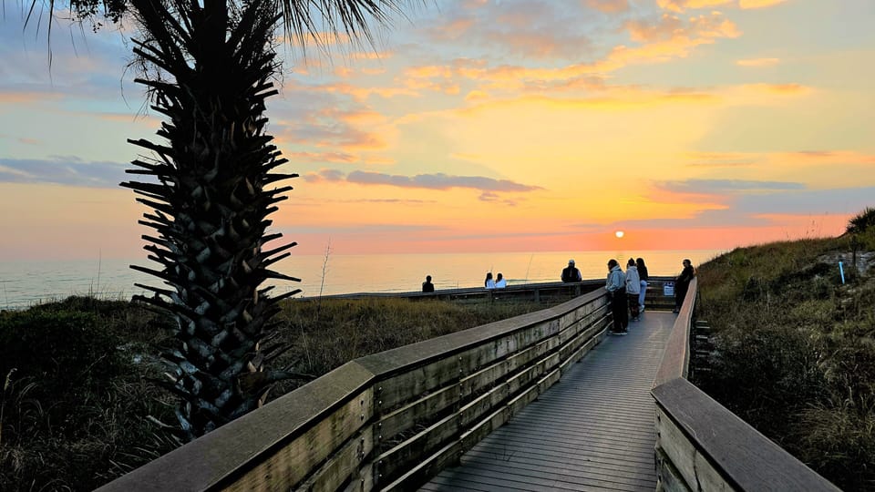 Easy boardwalk access to the beach—end your day with a peaceful sunset walk and 
