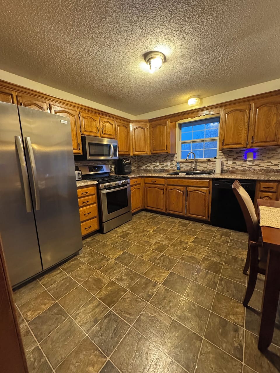 Fully furnished kitchen was gas stove, dishwasher and water and ice maker.