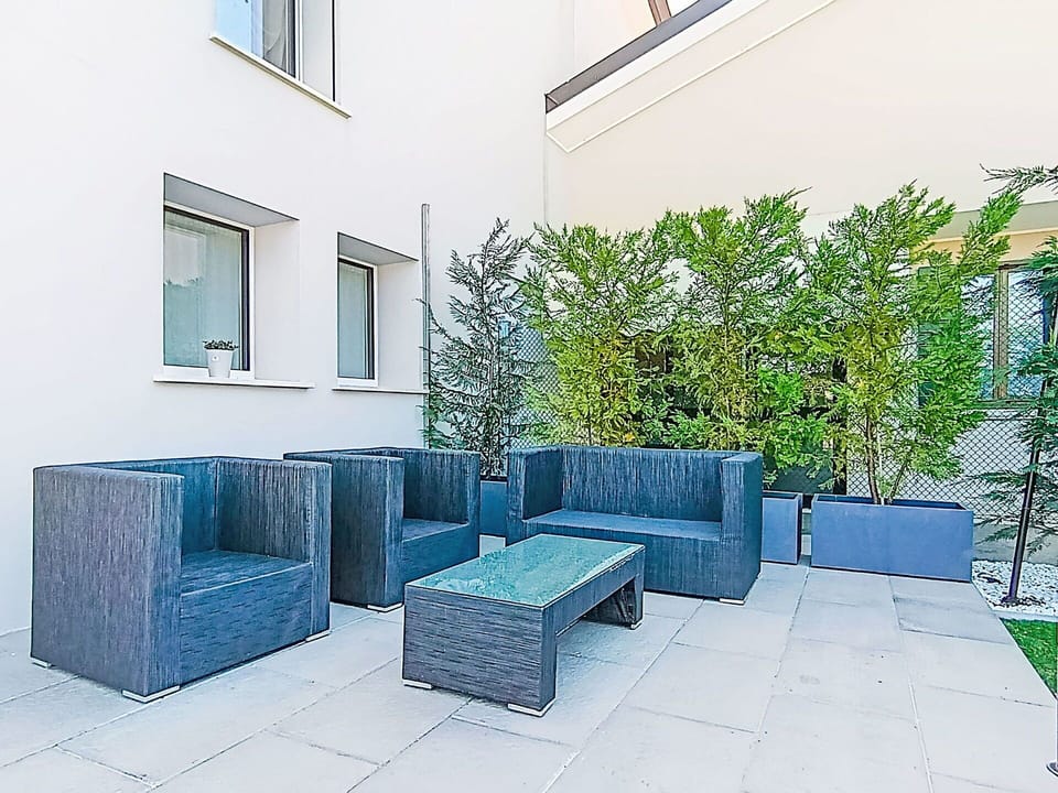 Furniture, Flooring, Floor, Interior Design, Outdoor Furniture, Chair, Flowerpot, Garden, Patio, Houseplant