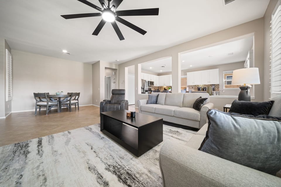 A welcoming living space with stylish seating and room for everyone to unwind.