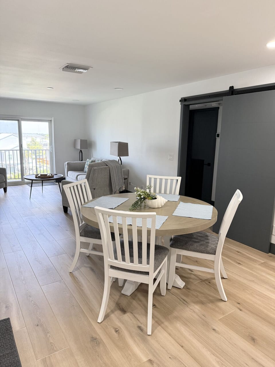 Open concept kitchen, dining, living area