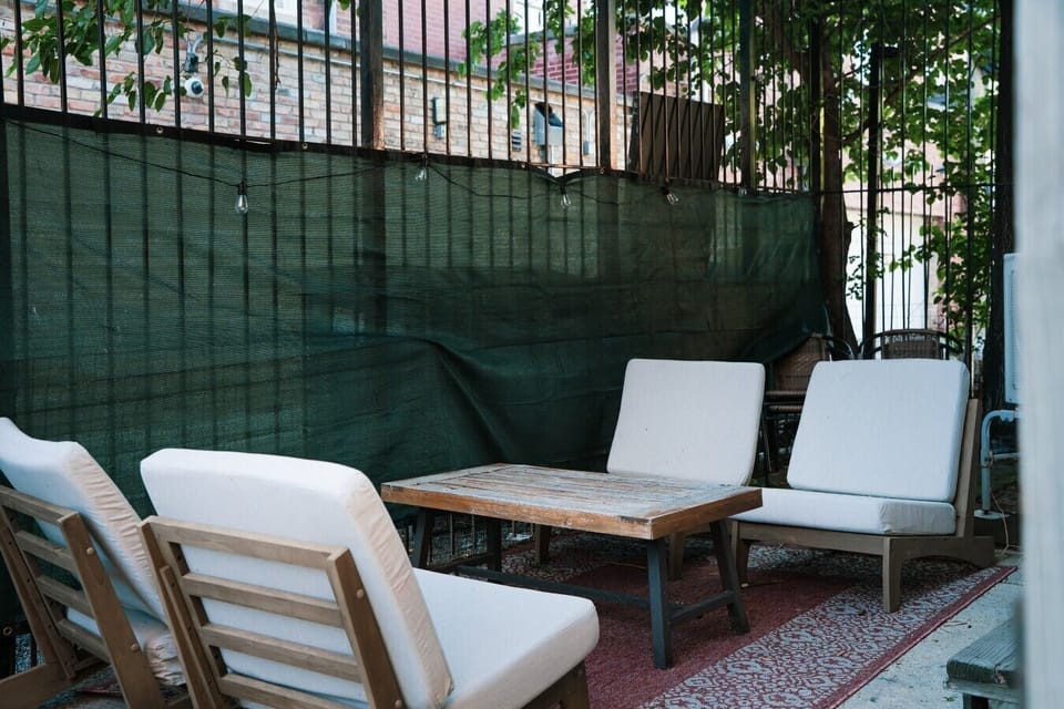 Shared outdoor patio with seating, ideal for a little downtime between city adventures