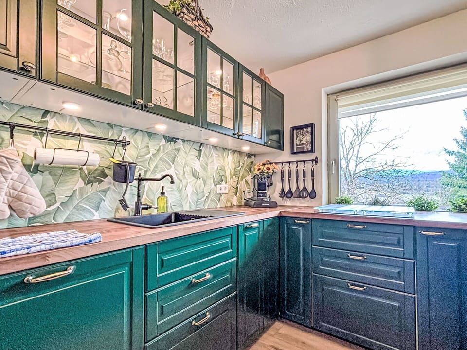 Cabinetry, Wood, Kitchen, Countertop, Drawer, Kitchen Appliance, Interior Design, Flooring, Cupboard, Major Appliance