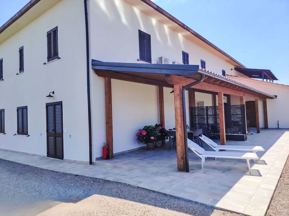 Door, Shade, Concrete, Outdoor Structure, Porch, Wood Stain, Home Door, Courtyard, Beam