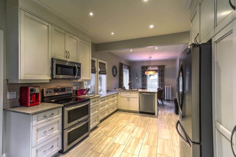 Enjoy a large and beautifully renovated kitchen perfect for preparing meals.