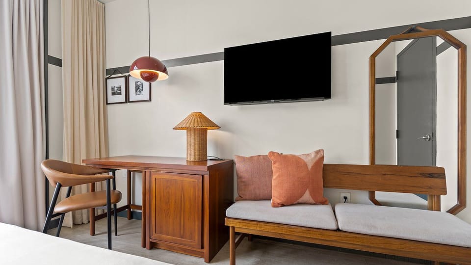 Settle in at the desk with warm ambient lighting.