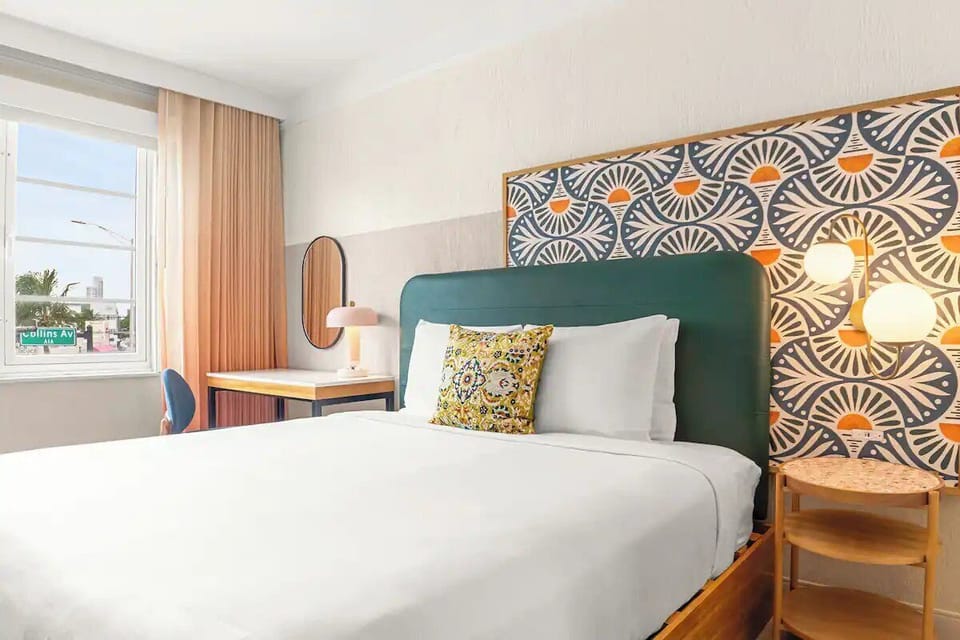 Recharge in a cozy bed framed by playful patterned accents.