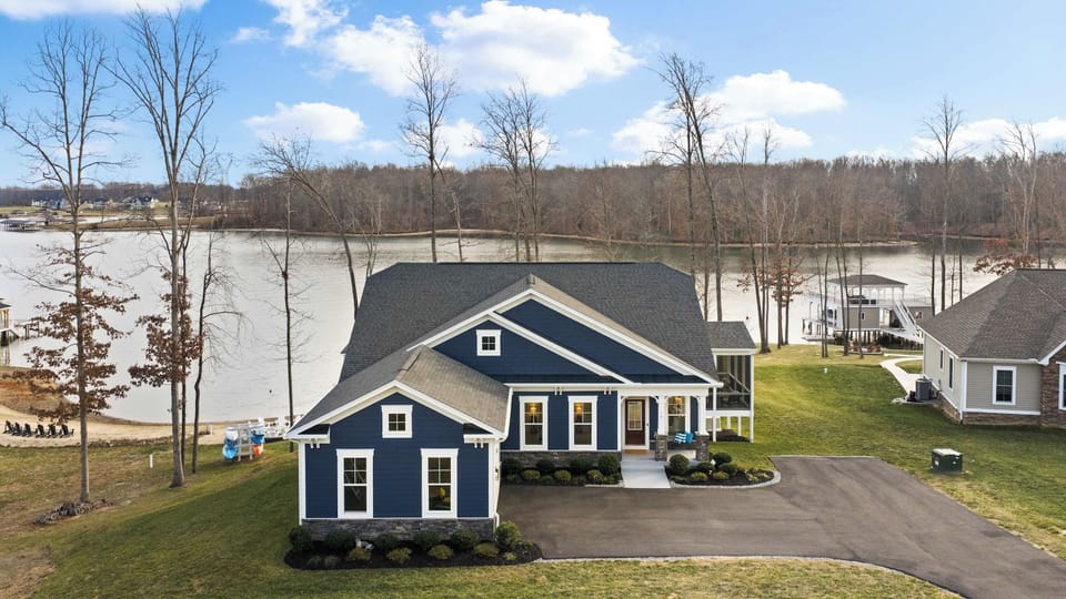 Boathouse - Aerial view of the property showing the boathouse position over the water with the house above on the hill.