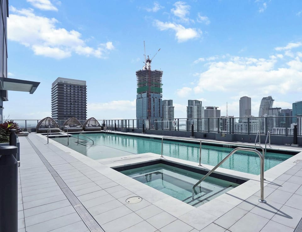 Cool off in the rooftop pool, the perfect spot to enjoy the surrounding skyline.