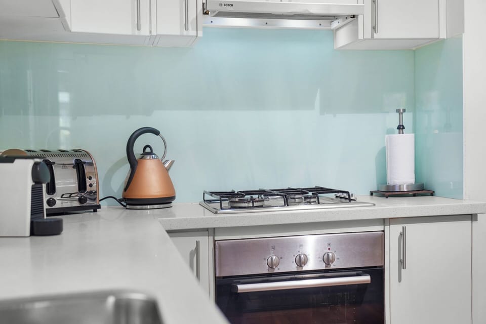 Fully equipped kitchen with hob, oven, microwave, fridge & dishwasher