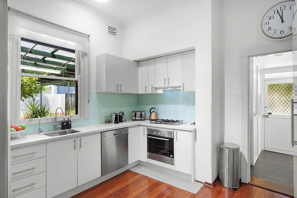 Bright fully equipped kitchen.