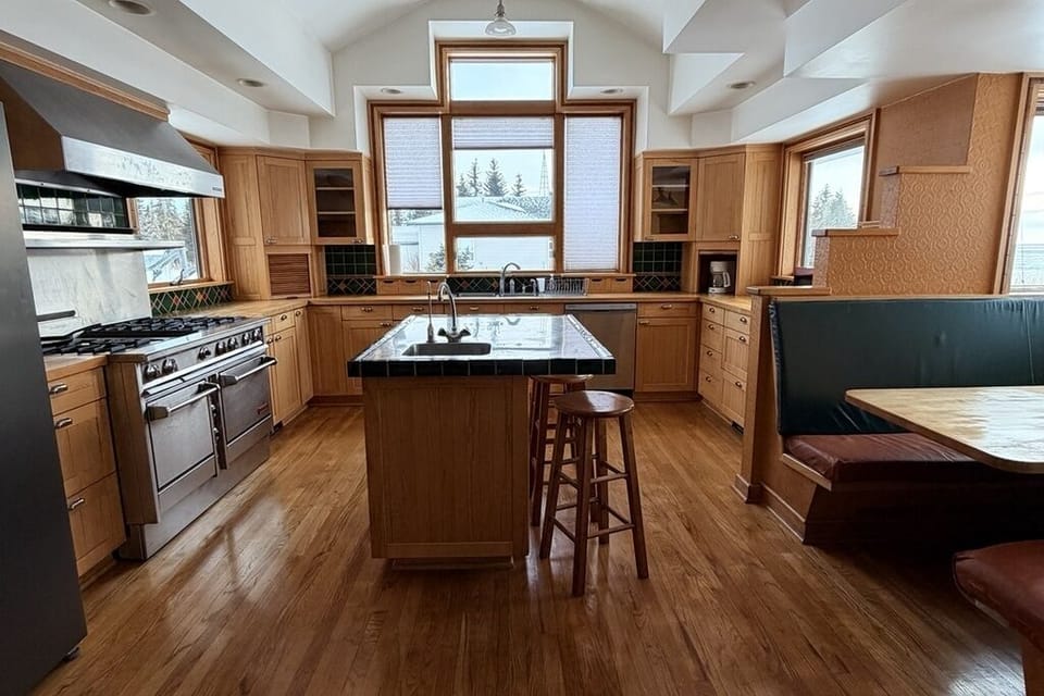 Full kitchen with comfy breakfast nook