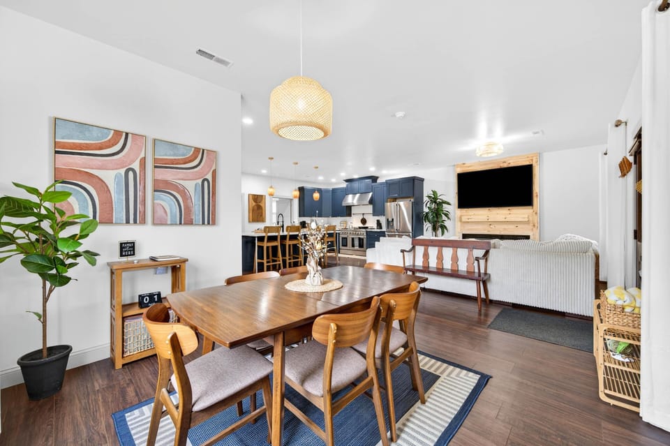 Spacious dining area with modern art and cozy ambiance