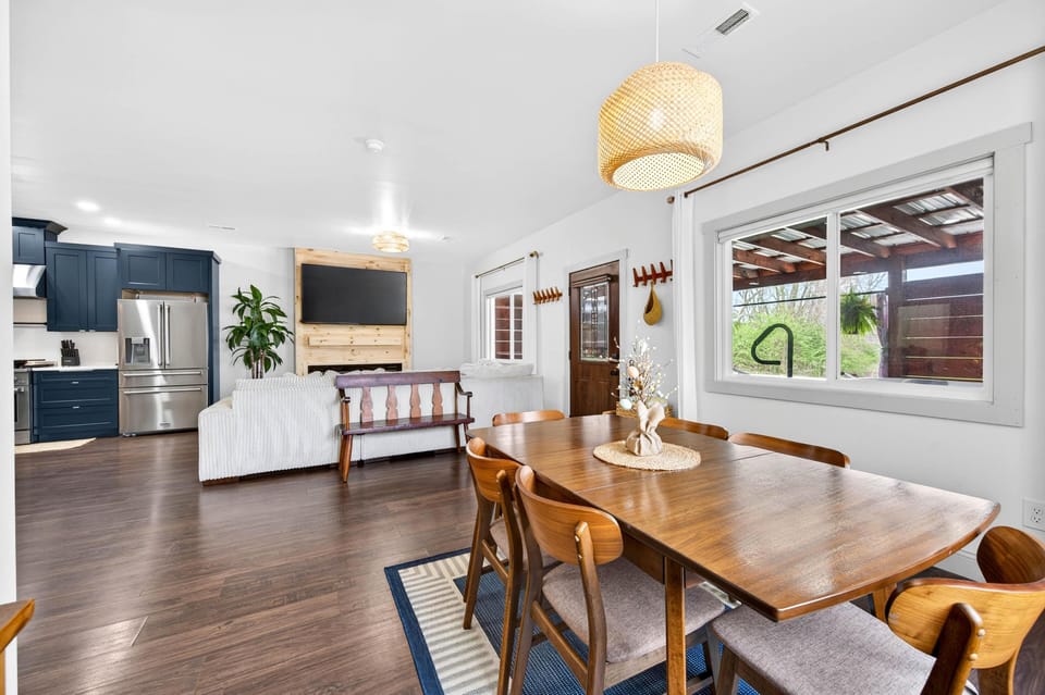 Bright open dining and living area with modern touches