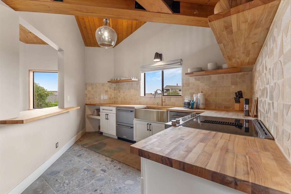 Fully equipped kitchen with modern appliances.