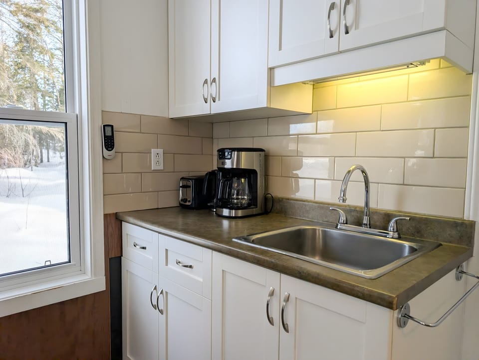 Cuisine entièrement équipée pour cuisiner comme à la maison.