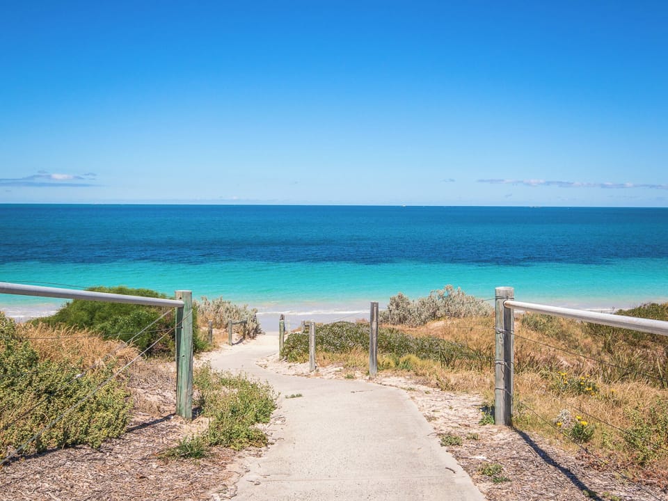 Stroll down to the stunning beach, located just across the street.