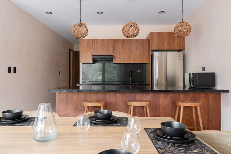 Stylish kitchen & dining with warm wood accents 🪵