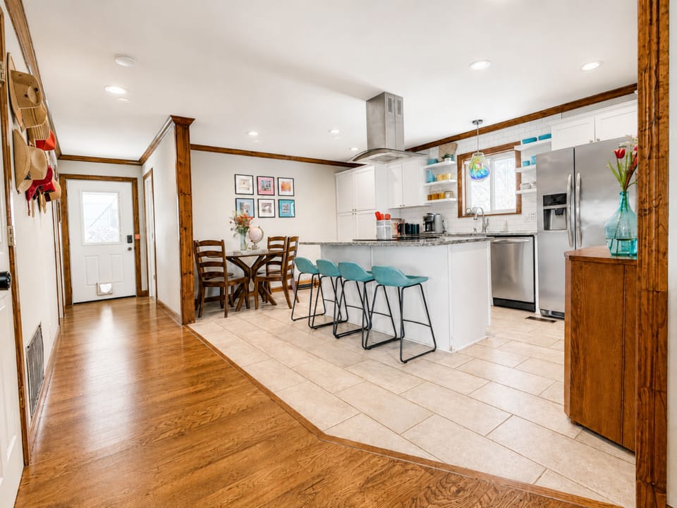 Open, spacious, and easy for gathering—this bright kitchen is ideal for brunch, wine and charcuterie nights, or private chef moments during your Rogers, AR girls trip.